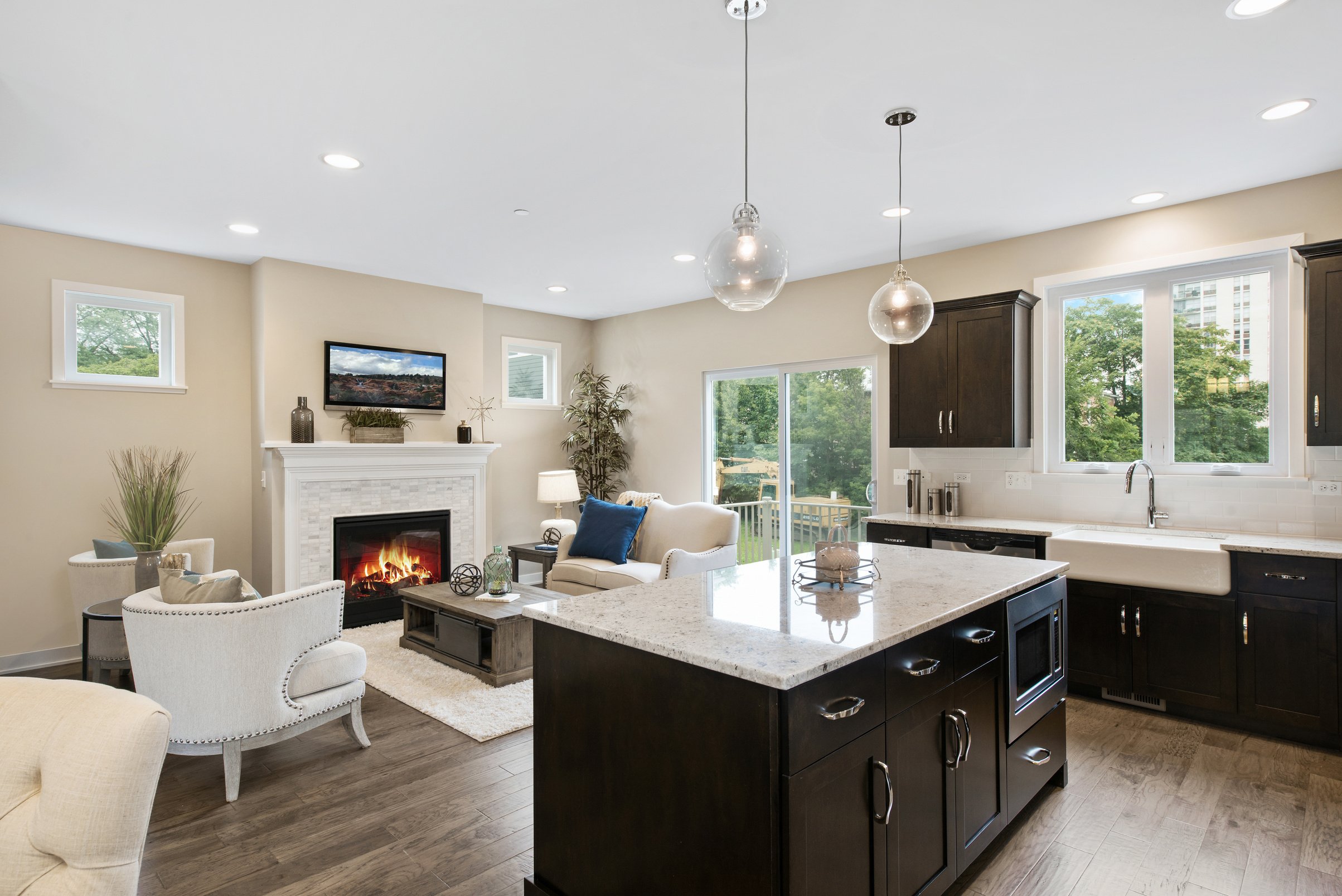 Kitchen island with quaint family room nearby